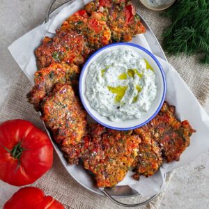 Have you ever tried Greek style tomato patties : tomatokeftedes ? Straight the island of Santorini, Greece.