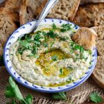 Discover this creamy and smoky baba ganoush recipe – a roasted eggplant and tahini dip that’s vegan, healthy, and full of flavor. Perfect for mezze, snacks or spreads!